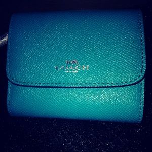 Brand new Coach Wallet. Never used still in packag